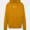 Bestes Angebot 🛒 Karl Kani ESSENTIAL HOODIE UNISEX - Kapuzenpullover - Cognac ✨ -Karl Kani Verkäufe 02f3ef2b65614eaca4b419eac24487eb