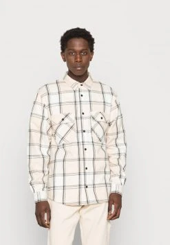 Top 10 🤩 Karl Kani CHEST SIGNATURE CHECK LIGHT UNISEX - Leichte Jacke - Light Sand 🤩