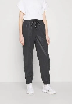 Blitzangebot ❤️ Karl Kani RETRO REFLECTIVE TRACKPANTS - Jogginghose - Black, Damen ✔️