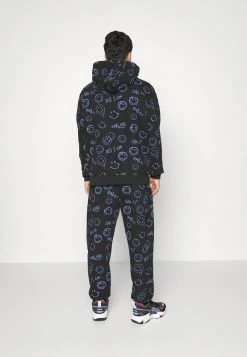 Neu ⌛ KARL KANI X SMILEY® SIGNATURE REGULAR FIT UNISEX - Jogginghose - Black ⭐ -Karl Kani Verkäufe 08ddb4089d824c799947faa31e2695c6