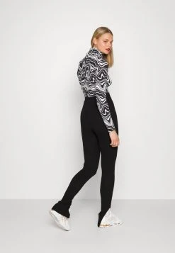Top 10 🥰 Karl Kani RETRO SLIT - Leggings - Hosen - Black, Damen ⭐ -Karl Kani Verkäufe 0eacde8b63964c95888b220c38b4cb21