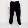 Bestpreis 🌟 Karl Kani SMALL SIGNATURE PANTS UNISEX - Jogginghose - Black 🎁