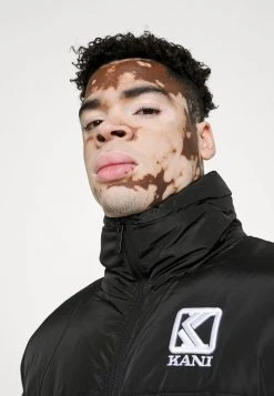Rabatt 🎁 Karl Kani BLOCK PUFFER JACKET UNISEX - Übergangsjacke - Black 🧨 -Karl Kani Verkäufe 3250b6d61ce44bc6ab1d189cea4cb6c5