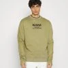 Blitzangebot ✔️ Karl Kani RETRO WASHED CREW UNISEX - Sweatshirt - Dark Green ✨ -Karl Kani Verkäufe 3c09db2787a541739a7acb7f5236309b