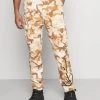 Rabatt ⭐ Karl Kani SIGNATURE CAMO CRINCLE PANTS - Cargohose - Beige/sand, Herren 🤩
