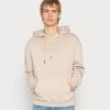 Billig 🔥 Karl Kani SIGNATURE BOX HOODIE UNISEX - Kapuzenpullover - Taupe 🎉 -Karl Kani Verkäufe 573d5d07beea43db9538742dfc6ea67a