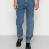 Am billigsten 🎁 Karl Kani SMALL SIGNATURE TAPERED FIVE POCKET - Jeans Tapered Fit - Vintage Indigo, Herren 🔔 -Karl Kani Verkäufe 5aea1f1bc9d143f682886a5ff7b5cff3