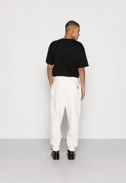 Rabatt ⌛ Karl Kani SMALL SIGNATURE UNISEX - Jogginghose - Cream 🎉 -Karl Kani Verkäufe 6107abc0a7fc4bb19671da6e0cf23ec5