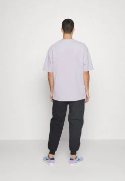 Brandneu ⌛ Karl Kani SMALL SIGNATURE QUILTED PANTS UNISEX - Stoffhose - Black 🧨 -Karl Kani Verkäufe 6c744fdf8dc741f78f5d314ab707d09c