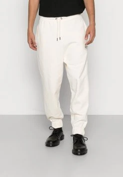 Rabatt ⌛ Karl Kani SMALL SIGNATURE UNISEX - Jogginghose - Cream 🎉