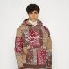 Brandneu ❤️ Karl Kani UNISEX SIGNATURE PAISLEY HOODIE - Sweatshirt - Light Sand 🥰