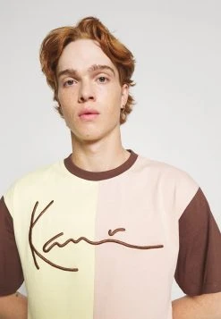 Coupon 🎁 Karl Kani UNISEX SIGNATURE BLOCK TEE - T-Shirt Print - Light Yellow ✔️ -Karl Kani Verkäufe 85bd52d566ff4dc8844d6d4988be50d0