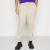 Bester Verkauf ✨ Karl Kani SIGNATURE UNISEX - Jogginghose - Light Sand 🧨 -Karl Kani Verkäufe 90339c0602044a9ca7319210238276f7