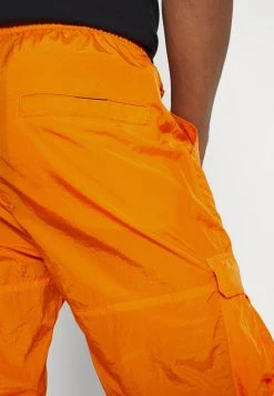 Besorgen 😀 Karl Kani SIGNATURE CRINCLE PANTS UNISEX - Cargohose - Orange ✨ -Karl Kani Verkäufe b3c784aa7aac457490173bdd64ce73b5