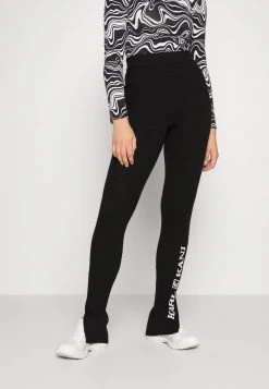 Top 10 🥰 Karl Kani RETRO SLIT - Leggings - Hosen - Black, Damen ⭐