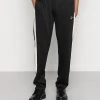 Am billigsten 🎁 Karl Kani SMALL SIGNATURE TRACKPANTS - Jogginghose - Black, Herren ⭐ -Karl Kani Verkäufe bca54631c8f343c998a56de752678e14