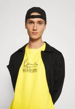 Coupon 🥰 Karl Kani SIGNATURE TEE UNISEX - T-Shirt Print - Yellow 🥰 -Karl Kani Verkäufe c25cc5cd60914d10987ffa66ca360616