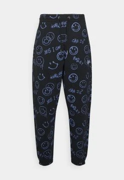 Neu ⌛ KARL KANI X SMILEY® SIGNATURE REGULAR FIT UNISEX - Jogginghose - Black ⭐ -Karl Kani Verkäufe c3145dba03ab44ba9a40d48cb4203dad