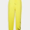 Coupon ✔️ Karl Kani UNISEX SIGNATURE REGULAR FIT - Jogginghose - Yellow ✔️ -Karl Kani Verkäufe c9a63792fdbe4e51a22a5ff8492b3c4e