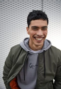 Bester Verkauf ⭐ Karl Kani UNISEX SMALL SIGNATURE OS HOODIE BLEACHED - Sweatshirt - Grey ⌛ -Karl Kani Verkäufe d6484e19703940ee9d63000e8e1df2cc