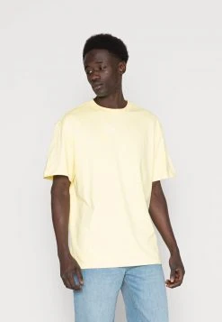 Großhandel 🥰 Karl Kani SMALL SIGNATURE ESSENTIAL TEE UNISEX - T-Shirt Basic - Light Yellow 😉