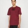 Großhandel ✨ Karl Kani RETRO WASHED TEE UNISEX - T-Shirt Print - Dark Red 🧨