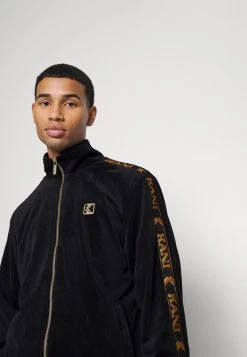 Am billigsten ⭐ Karl Kani TAPE JACKET - Trainingsjacke - Black, Herren ❤️ -Karl Kani Verkäufe e3036d0fb3ab4d1ca69bf48f270988ca
