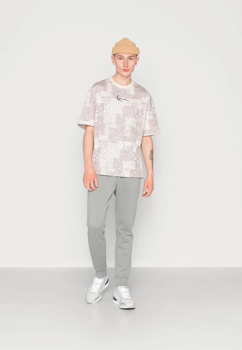 Brandneu ❤️ Karl Kani SMALL SIGNATURE TEE LIGHT UNISEX - T-Shirt Print - Sand 🥰 4 Brandneu ❤️ Karl Kani SMALL SIGNATURE TEE LIGHT UNISEX - T-Shirt Print - Sand 🥰 – Bild 2