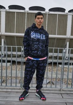 Neu ⌛ KARL KANI X SMILEY® SIGNATURE REGULAR FIT UNISEX - Jogginghose - Black ⭐