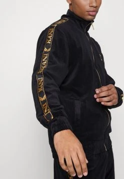 Am billigsten ⭐ Karl Kani TAPE JACKET - Trainingsjacke - Black, Herren ❤️ -Karl Kani Verkäufe f98065266ac14720993a514a3ab416fb