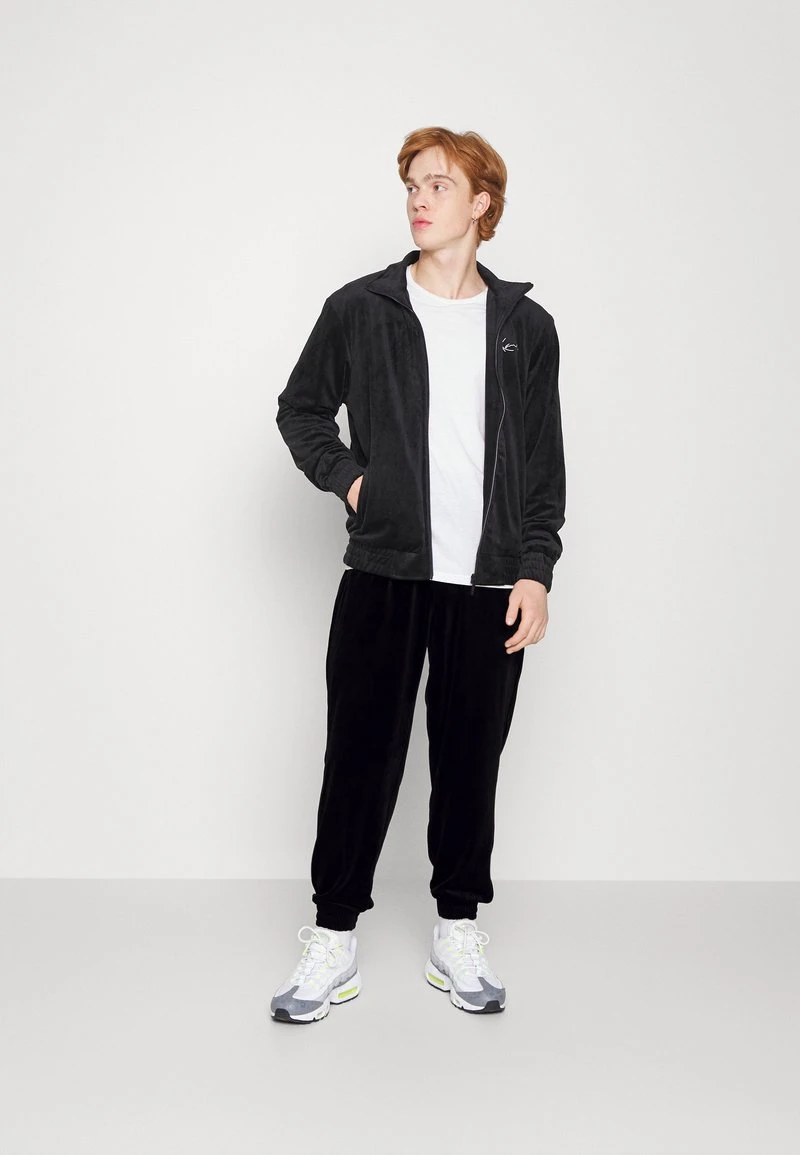 Bestpreis 🌟 Karl Kani SMALL SIGNATURE PANTS UNISEX - Jogginghose - Black 🎁 4 Bestpreis 🌟 Karl Kani SMALL SIGNATURE PANTS UNISEX - Jogginghose - Black 🎁 – Bild 2